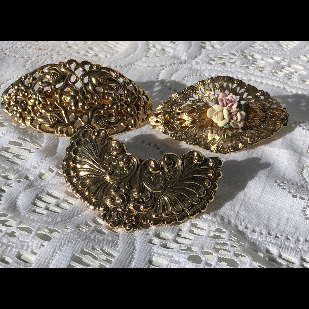 Three vintage made in France hair clips!